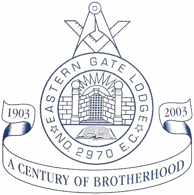 The centenary mark of the lodge: the lodge’s device of a gate and rising sun in a ring lettered EASTERN GATE LODGE NO. 2970 E.C., beneath a square and compasses, set between scrolls reading 1903 and 2003 above a longer scroll reading A CENTURY OF BROTHERHOOD.